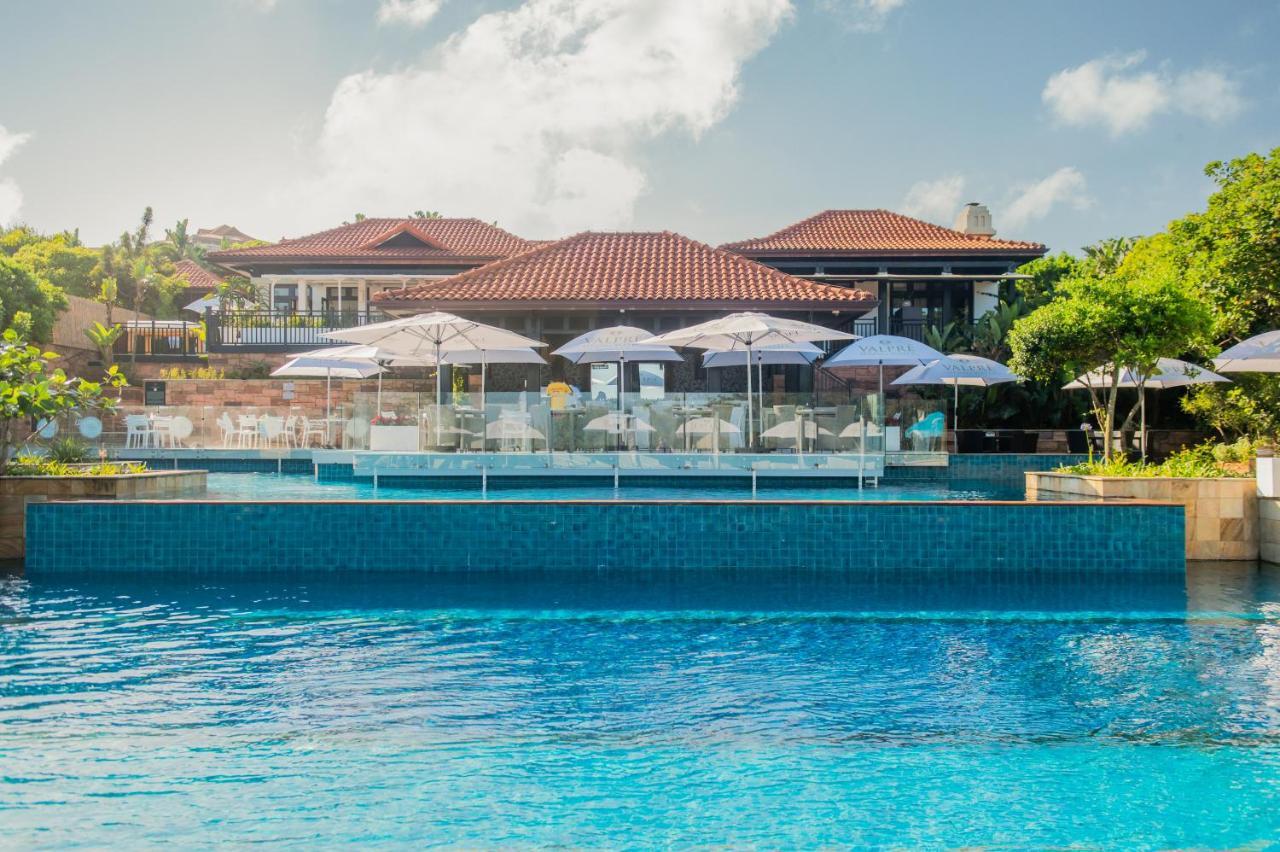 מלון בליטו The Capital Zimbali מראה חיצוני תמונה The swimming pool at the resort