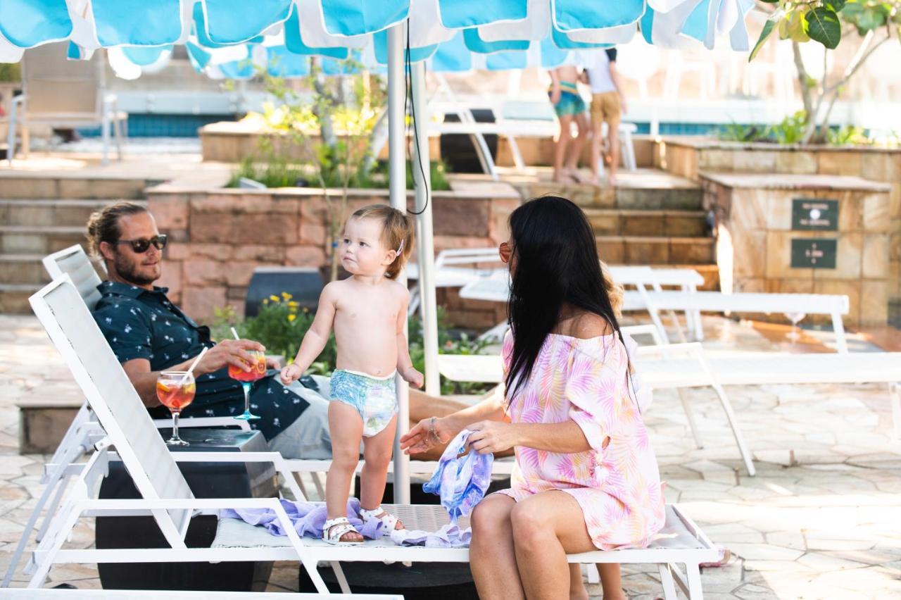 מלון בליטו The Capital Zimbali מראה חיצוני תמונה Family at the pool