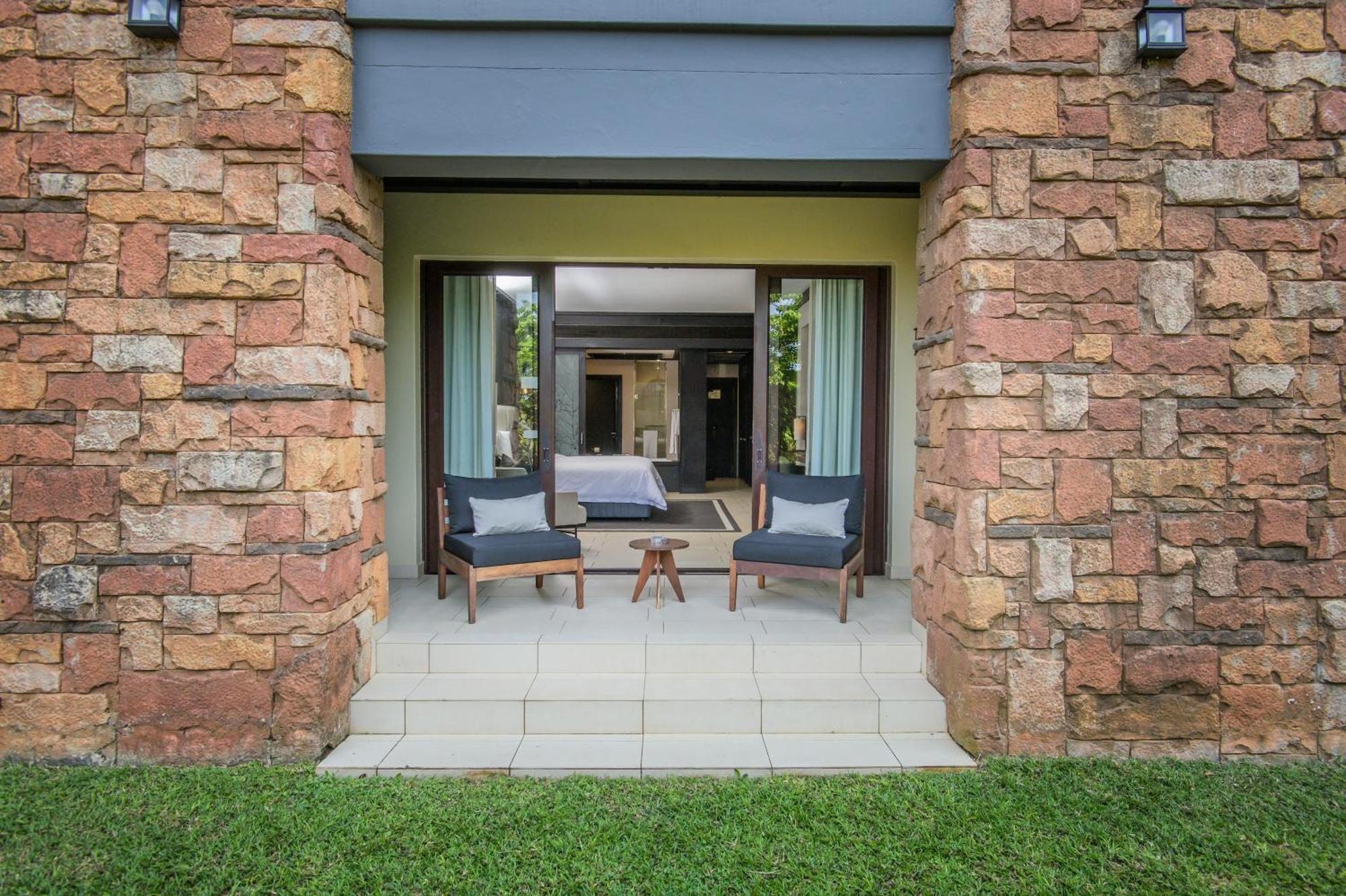 מלון בליטו The Capital Zimbali חדר תמונה A view of a guest room at the Oyster Box